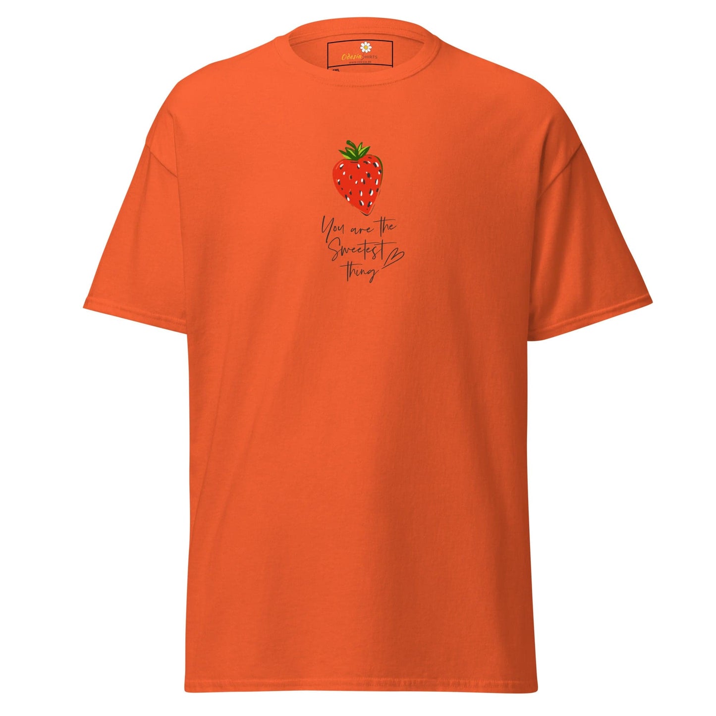 Orange t-shirt with strawberry design.